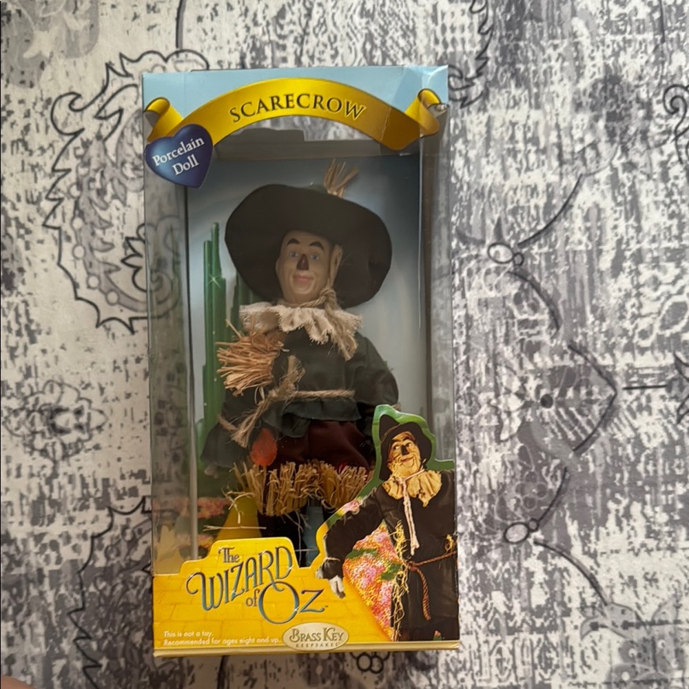 The Wizard of Oz Scarecrow Porcelain Doll by Brass Key - Green and Brown